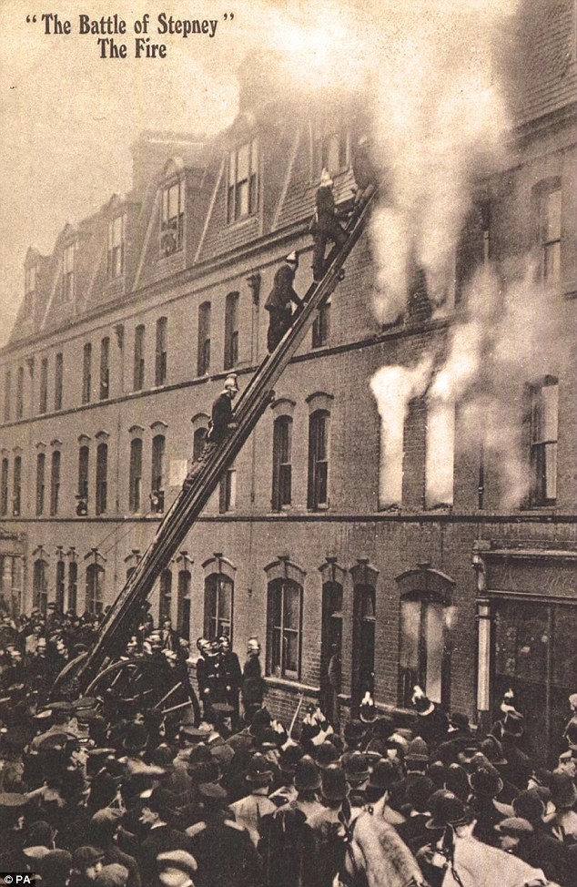 Firefighters on ladder